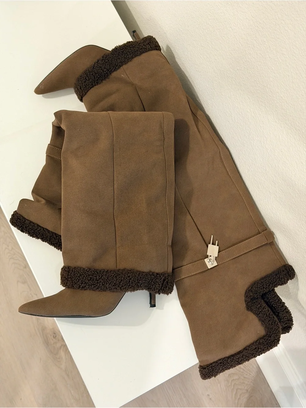Brown suede knee-high boots with faux fur trim